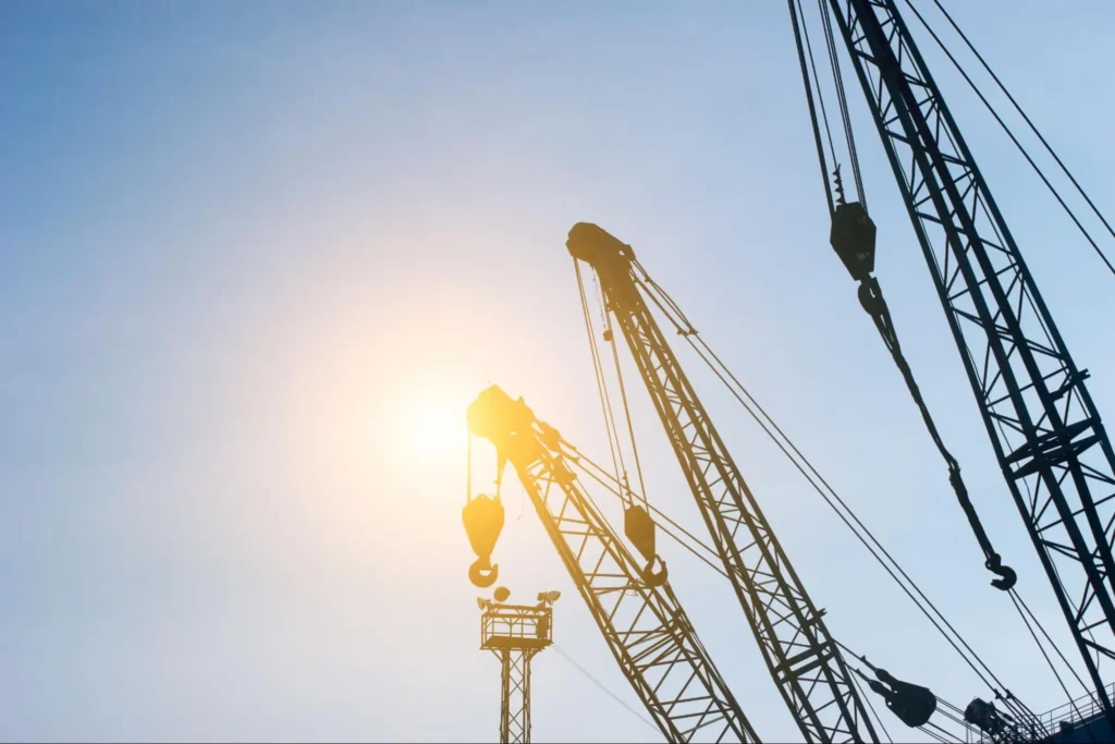 Construction Site Security and Surveillance | ASF Construction site with cranes and surveillance equipment for jobsite security by American Security Force