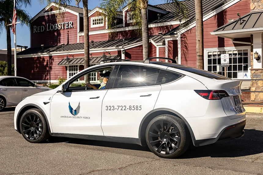 American Security Force mobile patrol vehicle providing restaurant security outside a Red Lobster location in Southern California